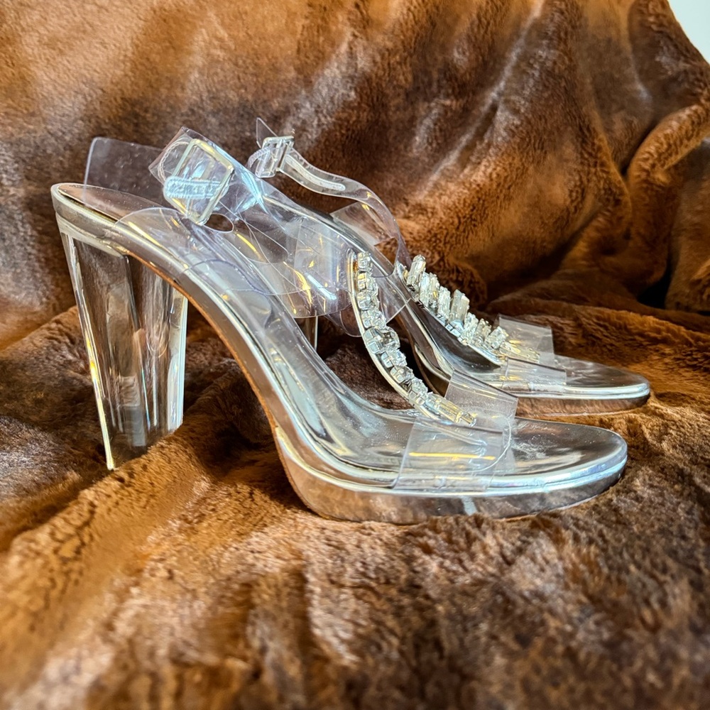 Size 10 silver, clear straps and jeweled embellishments. Stuart Weitzman.